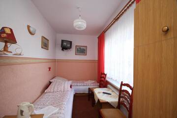 Фото номера Двухместный номер с 2 отдельными кроватями и общей ванной комнатой Проживание в семье Karolinka Łeba г. Леба 3