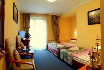 Фото номера Трехместный номер Отель Hotel Spinaker г. Леба 6