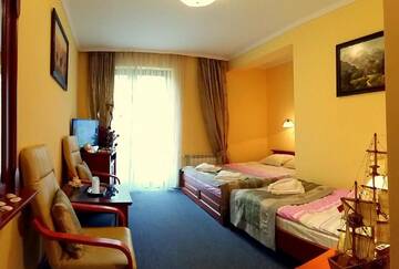 Фото номера Трехместный номер Отель Hotel Spinaker г. Леба 3