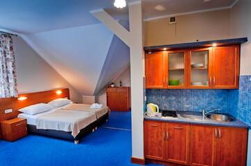 Фото номера Четырехместный номер Проживание в семье HL Łebski Rooms &amp; Apartments Pokoje z Kuchniami г. Леба 8