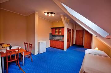 Фото номера Четырехместный номер Проживание в семье HL Łebski Rooms &amp; Apartments Pokoje z Kuchniami г. Леба 9