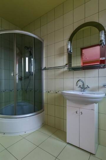 Фото номера Номер-студио Делюкс с кроватью размера &quot;king-size&quot; Комплексы для отдыха с коттеджами/бунгало Dom Wypoczynkowy Admirał г. Леба 5