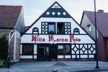 Фото номера Трехместный номер с балконом Проживание в семье Willa Marco Polo г. Леба 5
