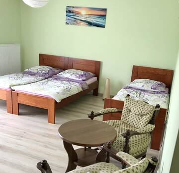 Фото номера Трехместный номер с балконом Проживание в семье Villa Marzenie г. Леба 2