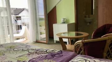 Фото номера Двухместный номер с 1 кроватью и балконом Проживание в семье Villa Marzenie г. Леба 6